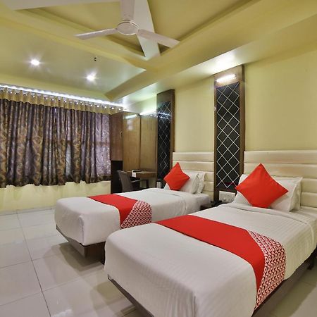 Capital O Kalash Residency Ahmedabad Bagian luar foto